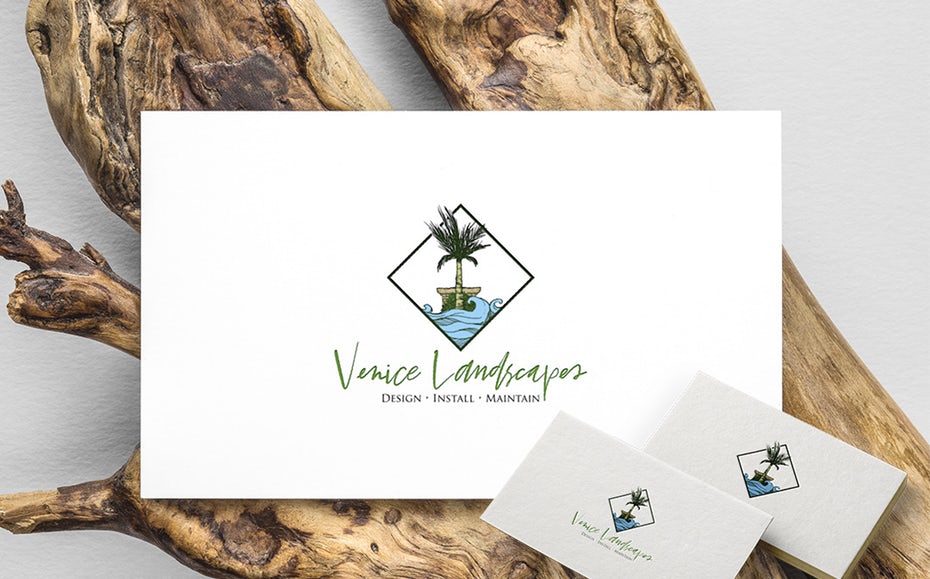 diamond-shaped  logo  showing a palm tree and water with the text “Venice Landscapes”